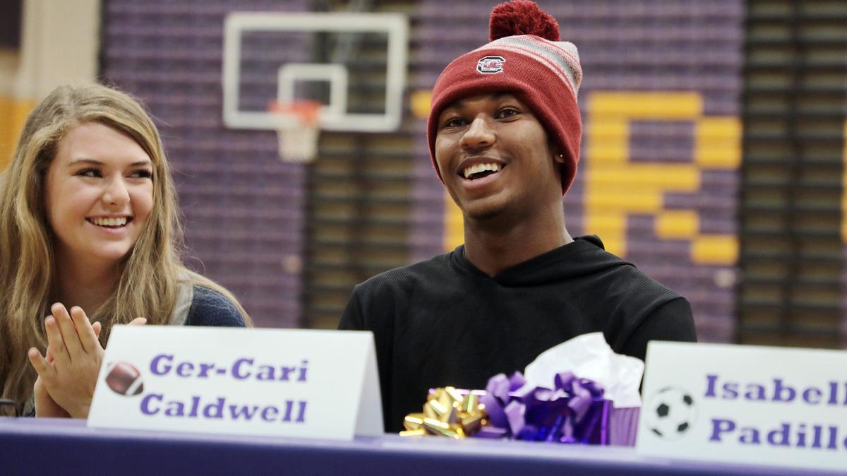 Northwestern’s Ger-Cari Caldwell, right, originally signed to play at South Carolina.