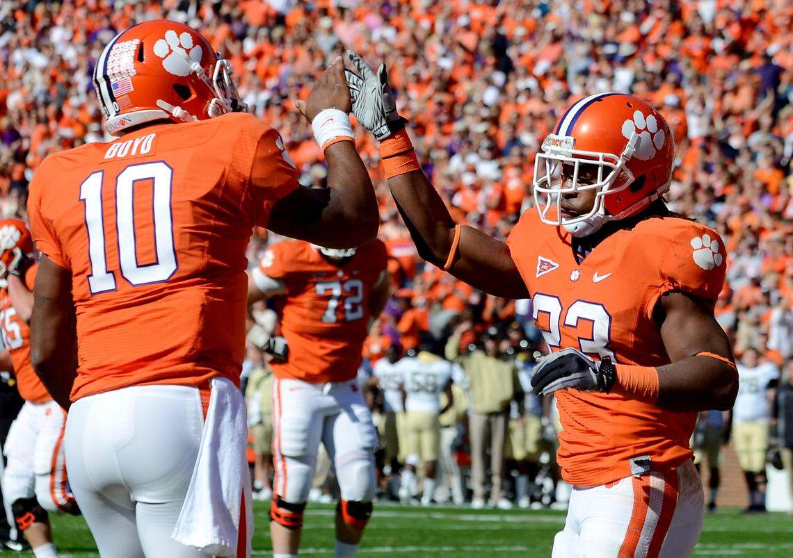 Clemson’s Tajh Boyd (10) and Andre Ellington celebrate Ellington’s first quarter touchdown against Wake Forest, Saturday, Nov. 12, 2011. Ellington cored twice and finished with 98 yards on 25 carries against Wake Forest in 2011.