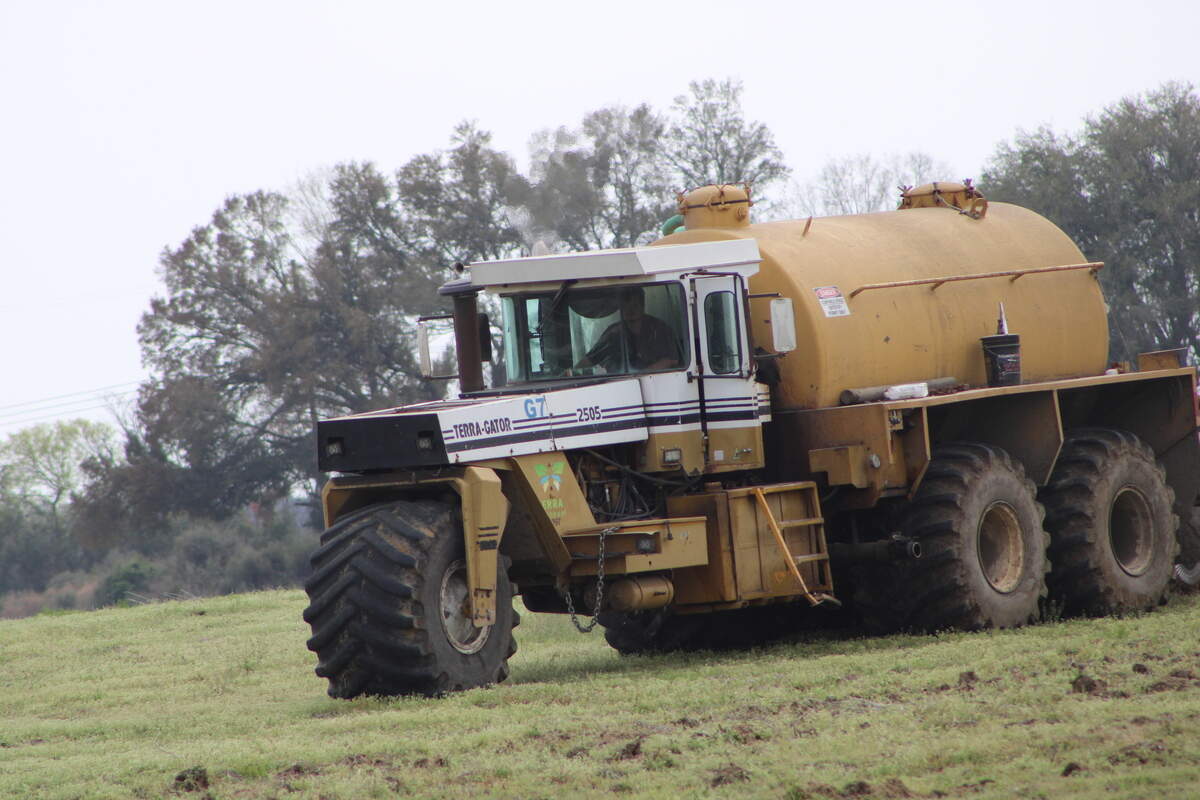 Farmers in South Carolina often use waste sludge as fertilizer. The material is believed to help crops grow, but there are questions about toxins in some types of sludge. This is a truck involved in a sludge spreading operation in Darlington County in March 2023.