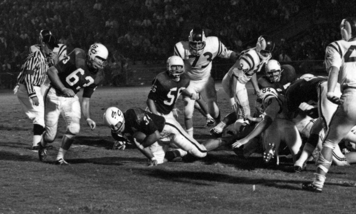 Mike Johnson (56) plays in the 1964 University of South Carolina football game against Duke on Sept. 19, 1964. 8/9/19