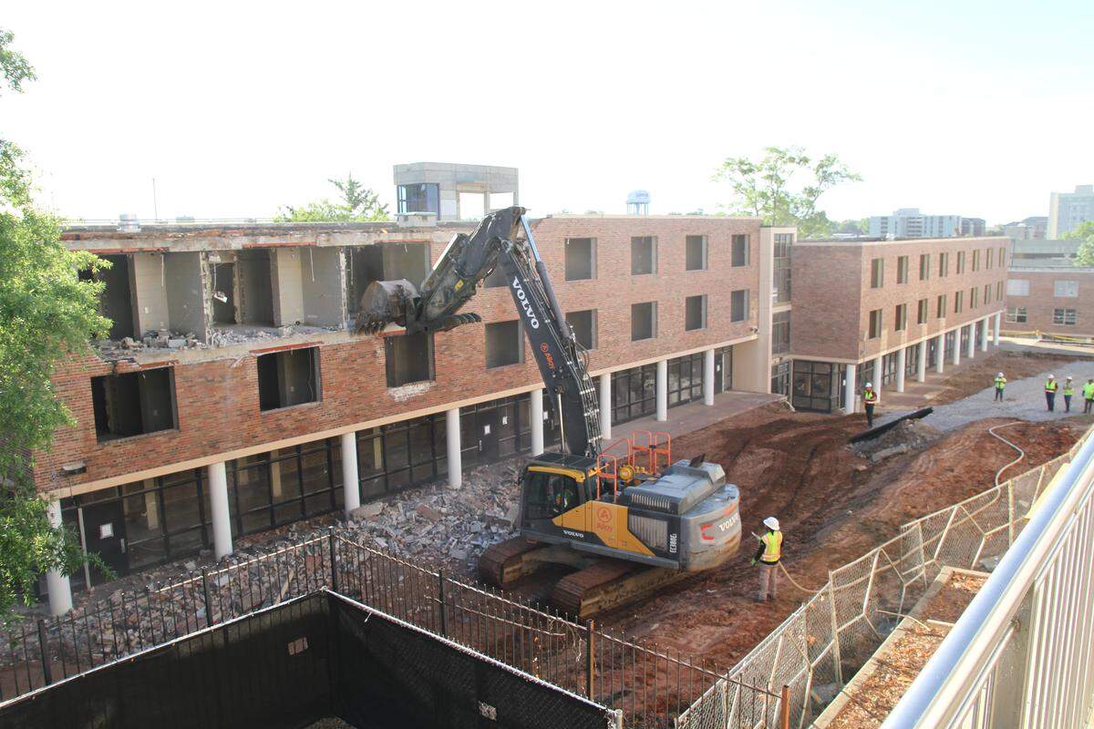 An excavator begins demolition of the McBryde residence hall on the University of South Carolina campus on Friday, May 8, 2026.