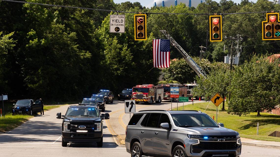 Deputies and officers with the Richland County Sheriff’s Department and other local public safety departments take part in a funeral procession for the sheriff’s department’s K9 Wick on Thursday, June 20, 2024. The Richland County Sheriff’s Department says Wick was struck by a vehicle early Thursday, June 20, and died at the scene.