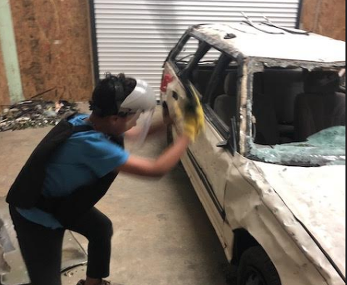 Among the stress relievers at The Smash Room is a car to beat up. Cars are rotated every three weeks by a salvage yard operator.