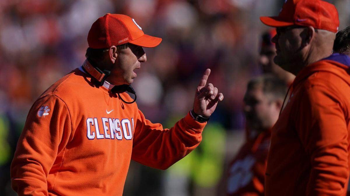Clemson head coach Dabo Swinney talks to the sideline players during the first half of an NCAA college football game against Wake Forest, Saturday, Nov. 20, 2021, in Clemson, S.C. (AP Photo/Brynn Anderson)