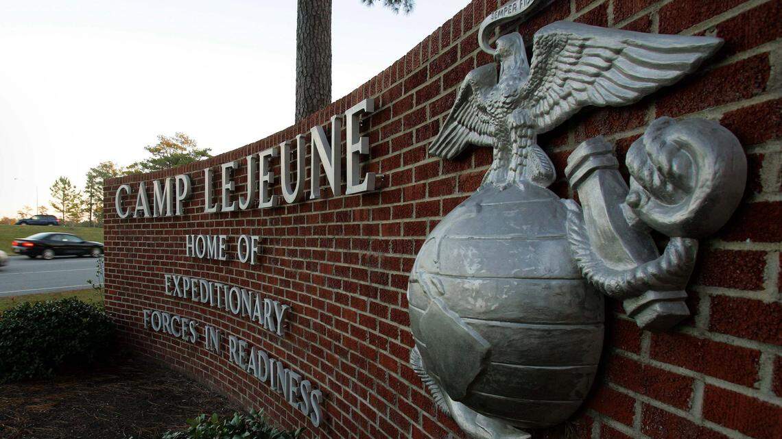 This is a file photo of the main gate at Camp Lejeune in Jacksonville, NC. A CDC agency determined that between 1953 and 1987 hundreds of thousands of Marines, their families, civilian workers and others living or working at the sprawling base were exposed to drinking water contaminated with industrial solvents, benzene, and other harmful chemicals.