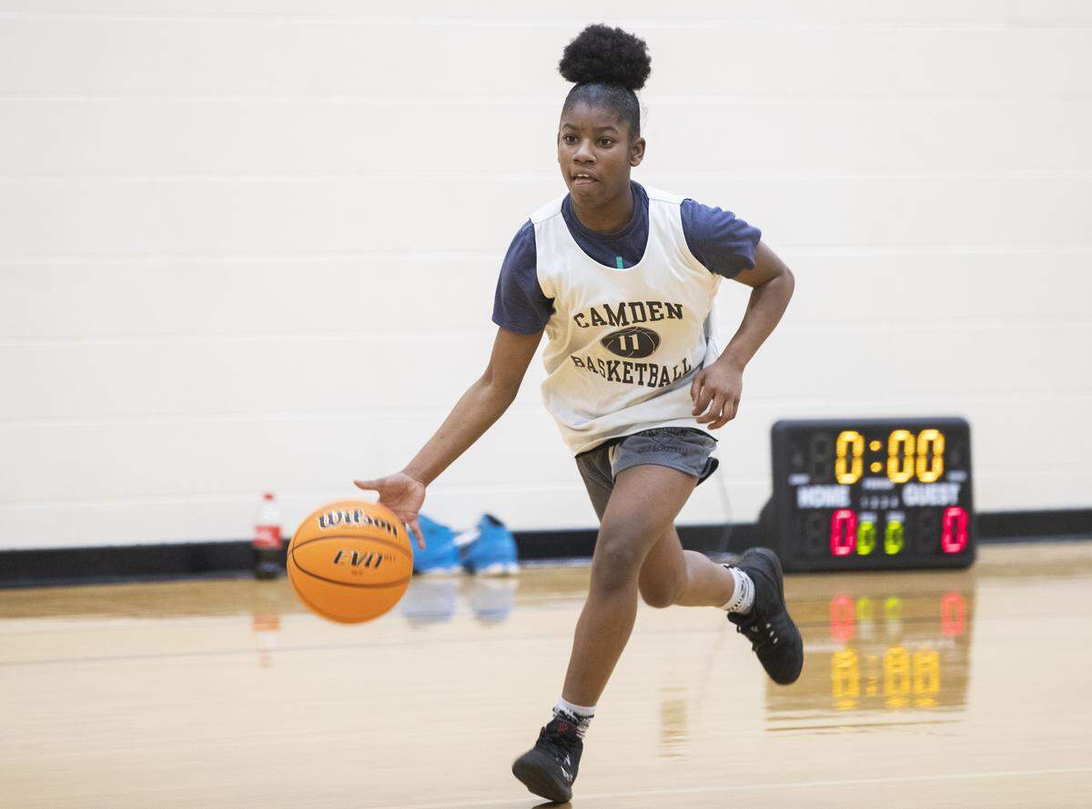 Zyasia Carter, an eighth grader, practices with the rest of the Camden High School’s girls basketball team at the school’s wellness center on Wednesday, January 27, 2020. The team has three eighth graders and one seventh grader on the team, with some of them starting.