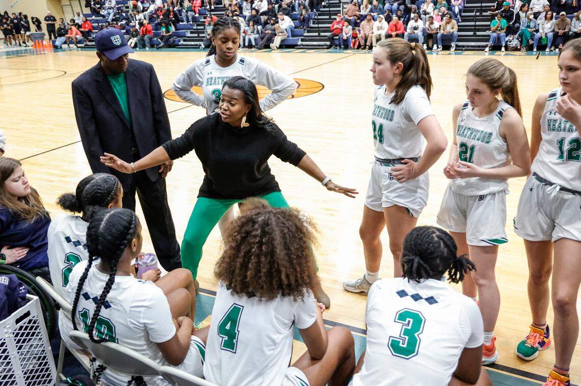 Heathwood Coach Brionna Zimmerman talks to her team during a time out during the second half of action against Northwood in the Class 4A SC Independent Schools Association championship at the Sumter Civic Center on Friday, Feb. 23, 2024