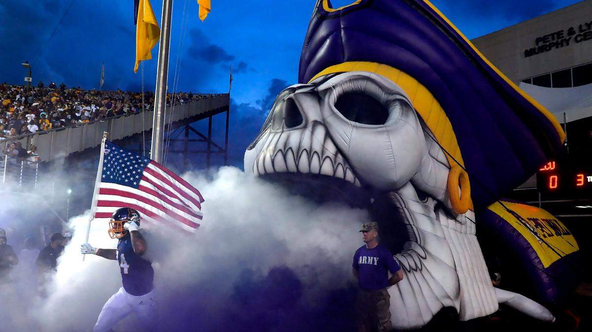 East Carolina University football players enter Dowdy-Ficklen Stadium to play N.C. A & T in Greenville, N.C., Saturday, Sept. 1,2018. Moments after this photo was taken the second mandatory evacuation due to lightning delayed the game.