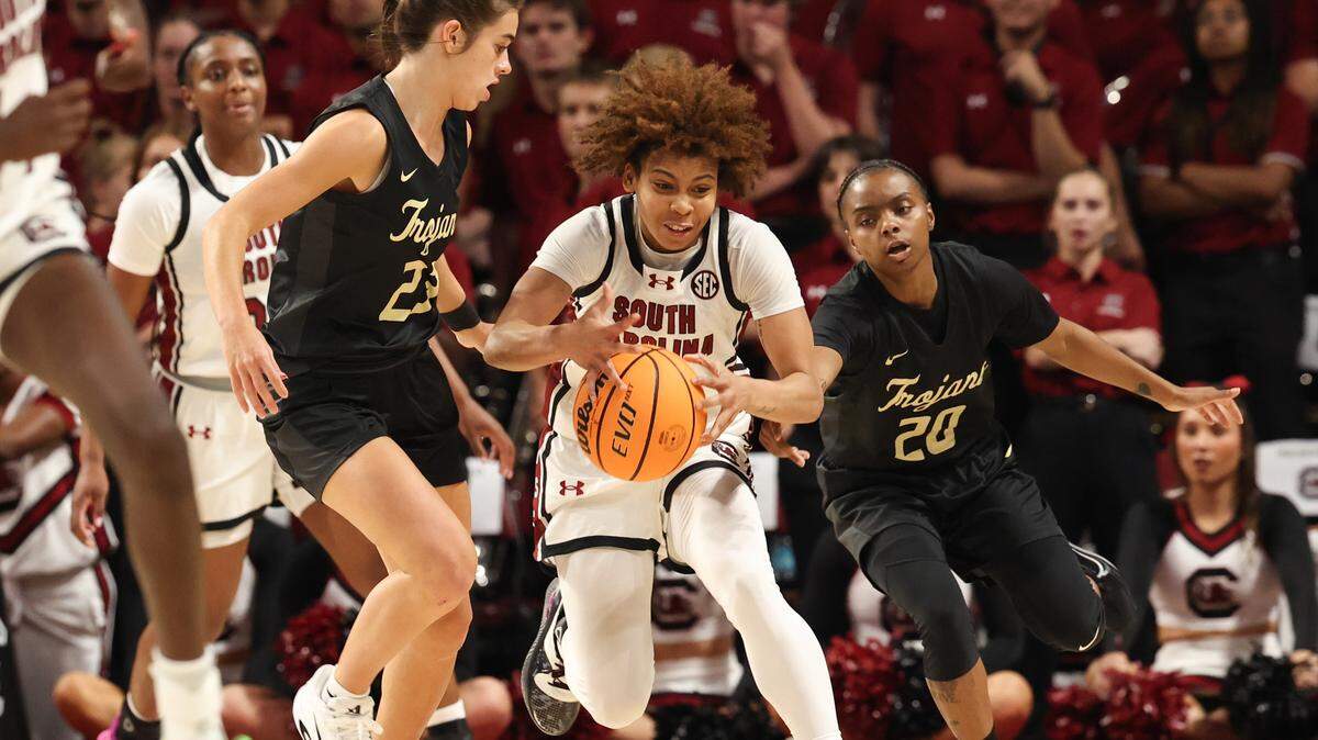 University of South Carolina's Maddy McDaniel (1) swipes the ball from Anderson's Kyia Barrett (23) during the second half of action at the Colonial Life Arena on Friday Oct. 24, 2025.