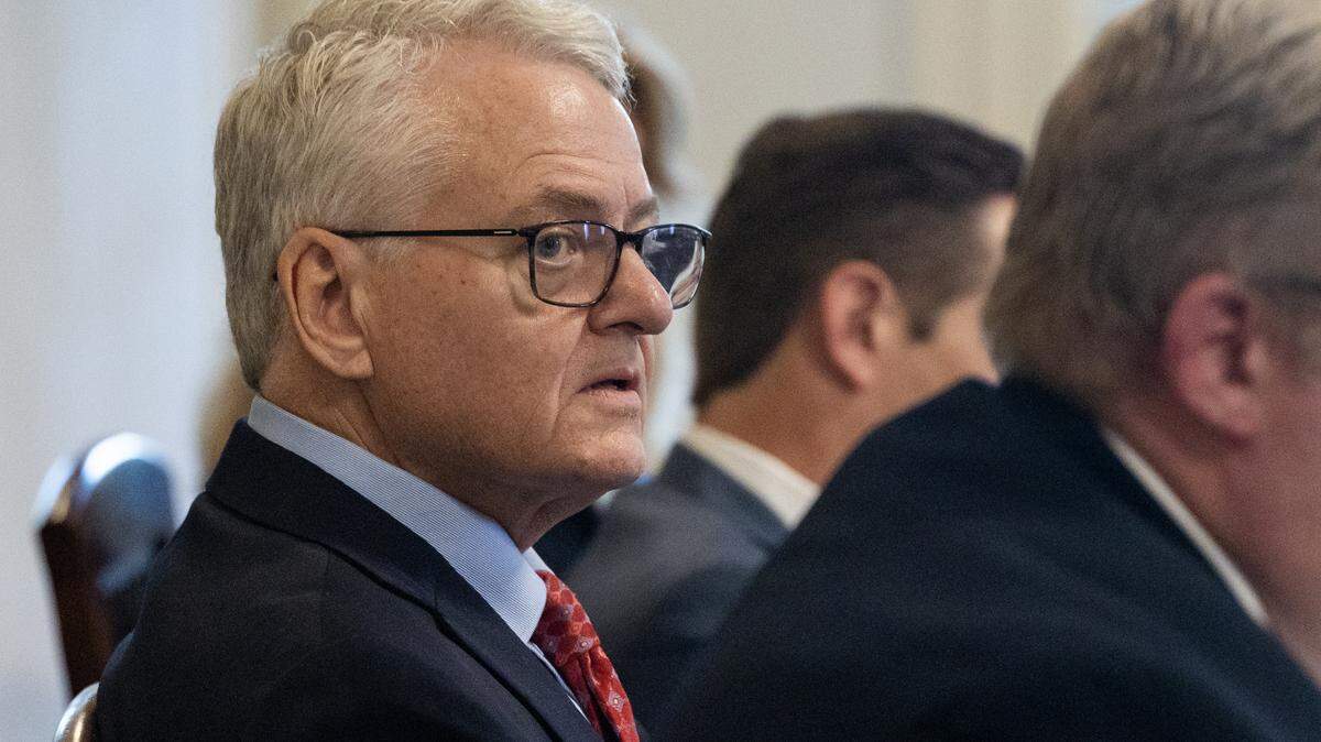 South Carolina State Treasurer Curtis Loftis listens as his team presents his defense in the South Carolina State Senate on Monday, April 21, 2025.