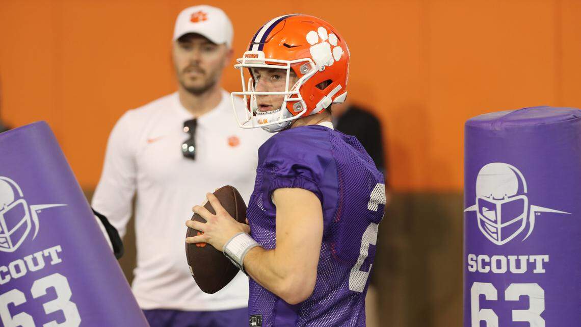 Clemson quarterback Cade Klubnik (2) and offensive coordinator Garrett Riley during the Tigers’ opening day of spring practice at the Allen N. Reeves Football Complex on March 6, 2023.