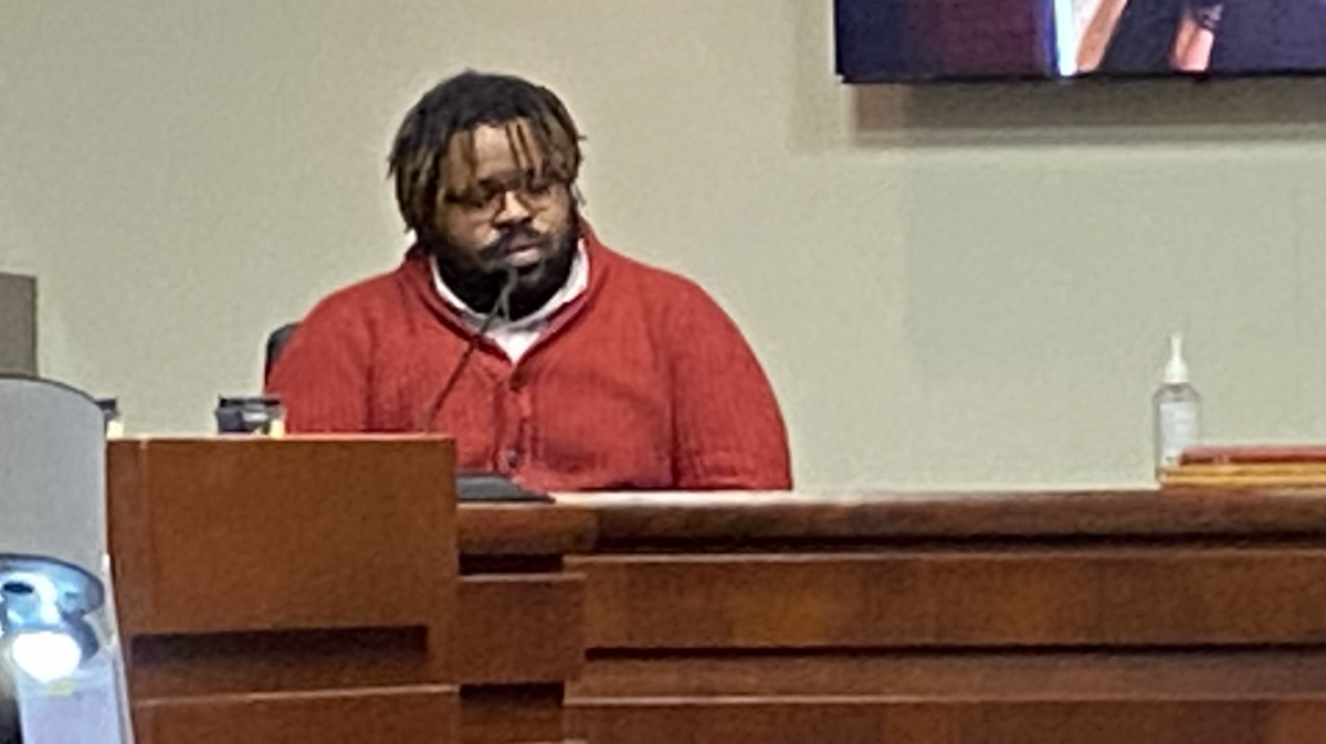 Austin Robinson testified his wife beat their foster daughter with a belt before she died.