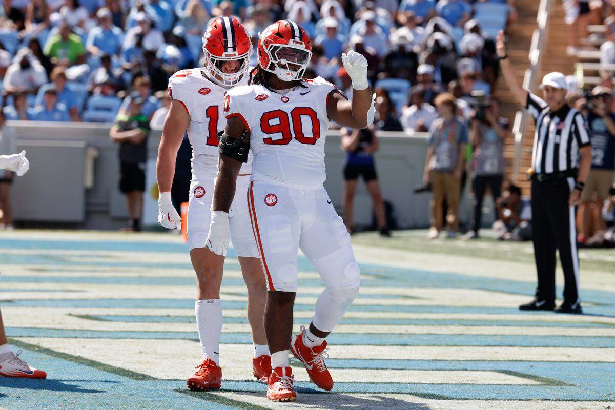 Stephiylan Green #90 of the Clemson Tigers reacts after sacking Max Johnson of the North Carolina Tar Heels (not pictured) during the first half at Kenan Memorial Stadium on October 4, 2025 in Chapel Hill, North Carolina.