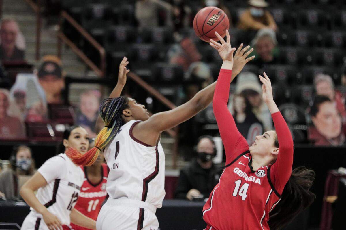 South Carolina Gamecocks forward Aliyah Boston (4) blocks Georgia Lady Bulldogs center Jenna Staiti (14) at Colonial Life Arena on Thursday, January 21, 2021.