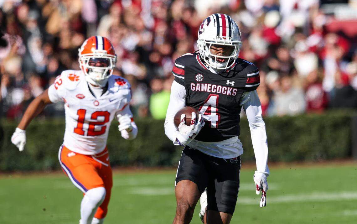 South Carolina wide receiver Vandrevius Jacobs (4) carries the ball for a touchdown during first half of South Carolina’s game against Clemson at Williams-Brice Stadium in Columbia on Saturday, November 29, 2025.
