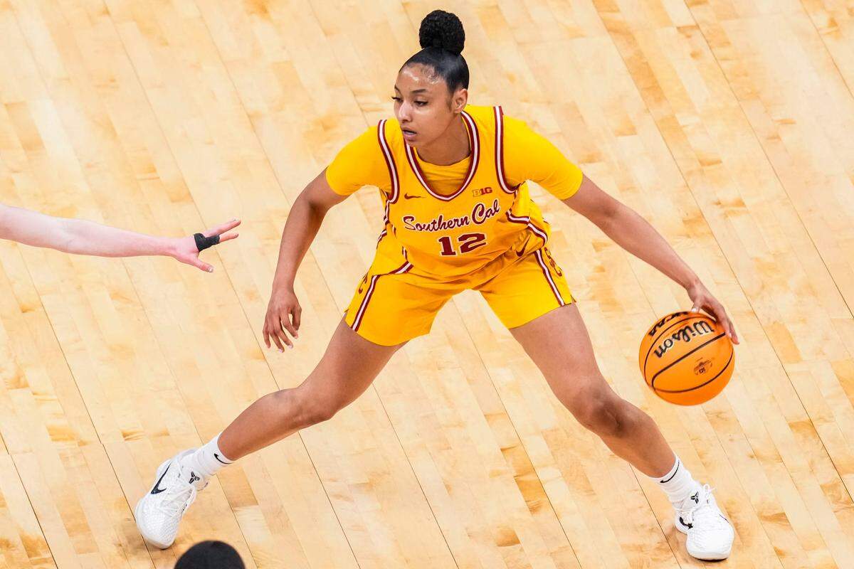 USC Trojans guard JuJu Watkins (12) runs a play Saturday, March 8, 2025, in a semifinals game at the 2025 TIAA Big Ten Women’s Basketball Tournament between the Iowa Hawkeyes and the Ohio State Buckeyes at Gainbridge Fieldhouse in Indianapolis.