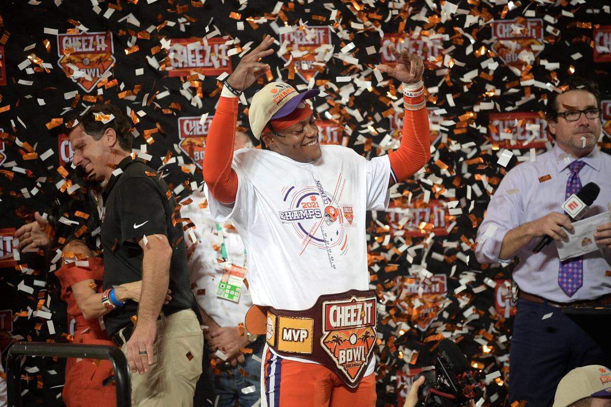 Clemson cornerback Mario Goodrich (31) shows off the belt given to him for being named the MVP after the Cheez-It Bowl NCAA college football game against Iowa State, Wednesday, Dec. 29, 2021, in Orlando, Fla. (AP Photo/Phelan M. Ebenhack)