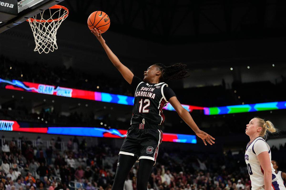 South Carolina Gamecocks guard MiLaysia Fulwiley (12) scores a layup past TCU Horned Frogs guard Hailey Van Lith (10) during the first half at Dickies Arena.