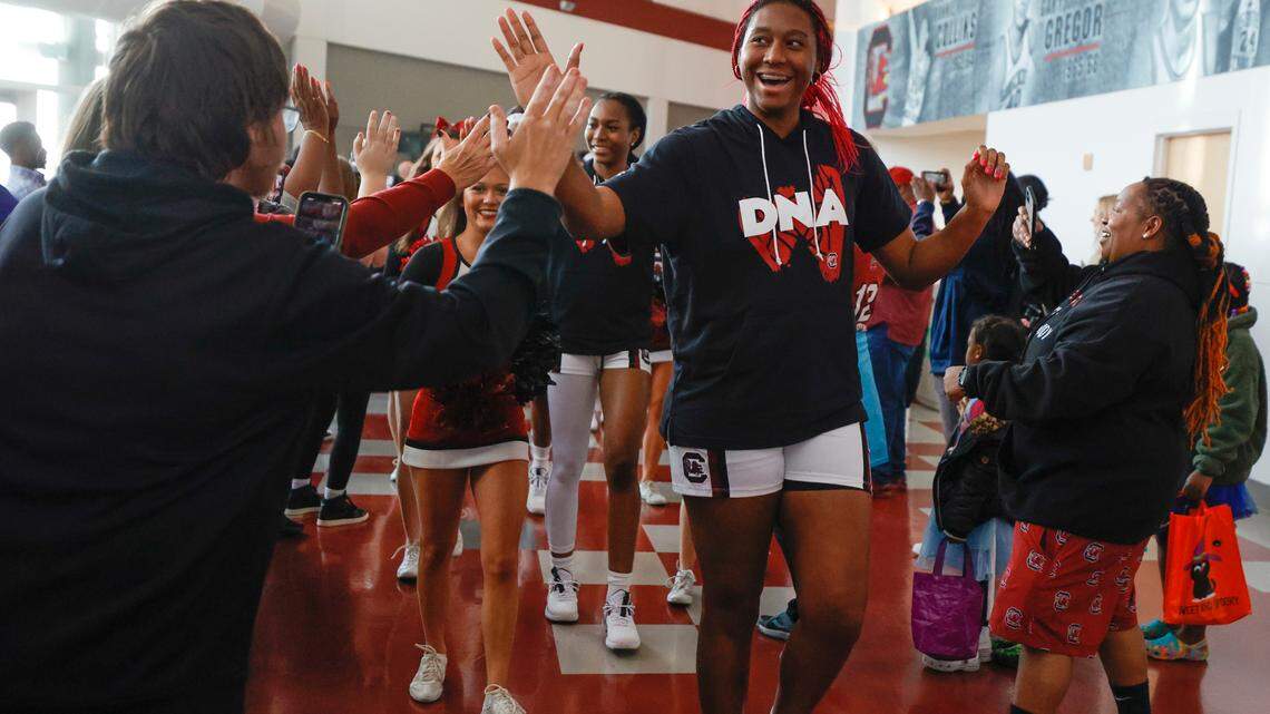 South Carolina’s Aliyah Boston (4) and the University of South Carolina Women’s basketball team greets fans in the Colonial Life Arena prior to their exhibition game against Benedict College on Monday Oct. 31 2022.
