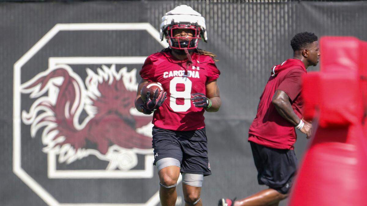University of South Carolina’s Christian Beal-Smith (8) runs drills during the team’s first practice on Friday, Aug. 5, 2022.