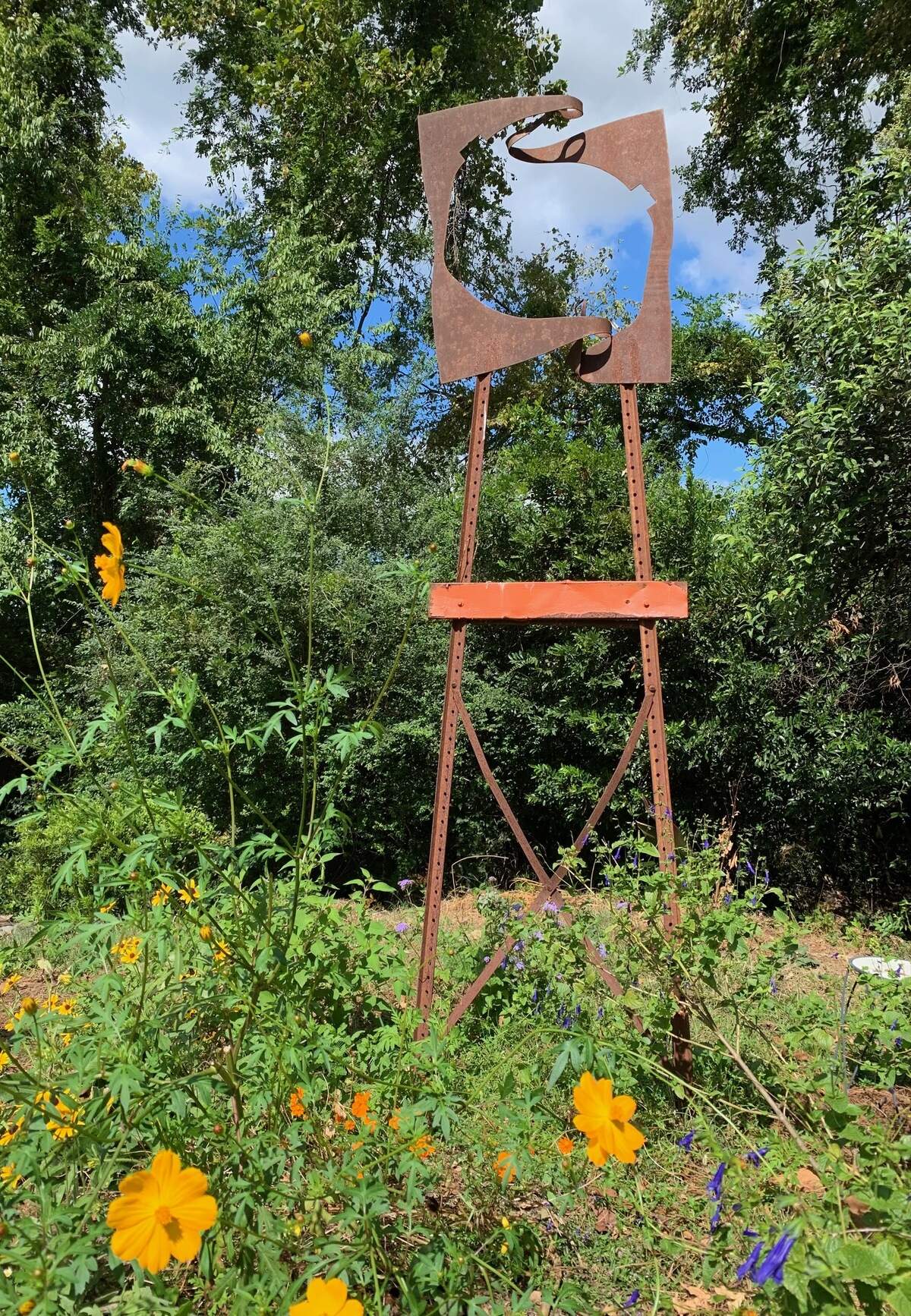 This sculpture, by Columbia artist Eileen Blyth, was knocked down and damaged as trees were cleared at a hotel site next to a popular art venue. Work on the hotel site next door encroached onto the Stormwater Studios property. A veneer of vegetation between the studio and the hotel site was cleared. This photo was taken before the December 2024 clearing was done.