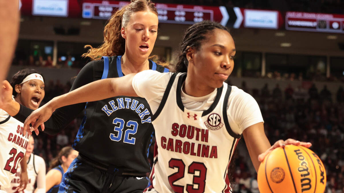University of South Carolina’s Bree Hall (23) moves the ball as Kentucky’s Amelia Hassett (32) pressures during the first half of action in the Colonial Life Arena on Sunday, March 2, 2025.
