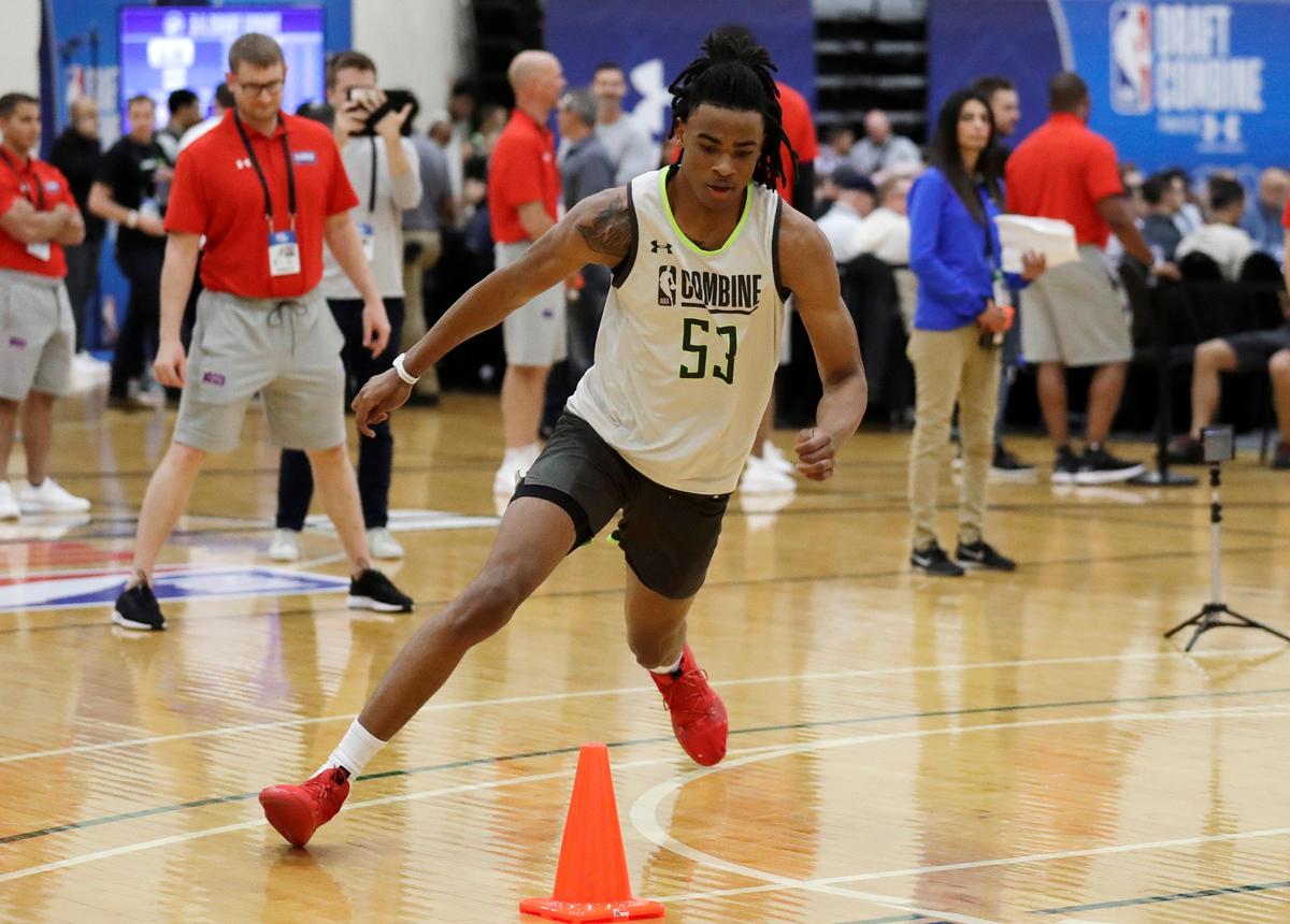 Nicolas Claxton participates in a drill during the second day of the NBA draft basketball combine in Chicago, Friday, May 17, 2019.