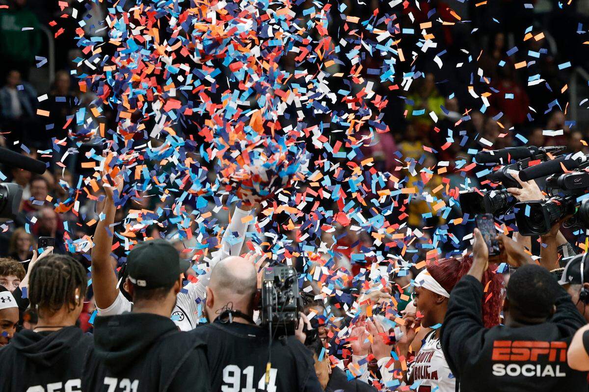 The Gamecocks celebrate winning the Elite Eight matchup with Oregon State at the MVP Arena in Albany, New York on Sunday, March 31, 2024.