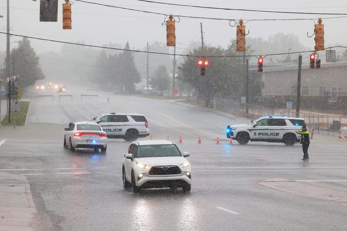 Columbia Police Department redirects traffic around closed roads near Blossom and Huger Streets as Hurricane Helene hits Columbia, South Carolina on Thursday, September 26, 2024.