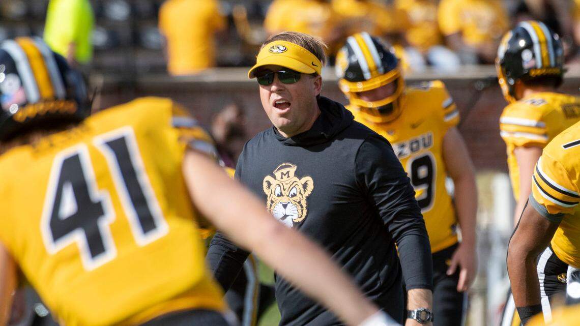 Missouri head coach Eliah Drinkwitz watches his team warm-up before Saturday’s game against Vanderbilt.