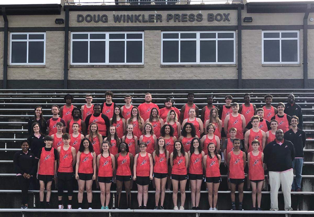 The 2019 Liberty track team poses for a team photo. C.J. Spiller is in the top right.