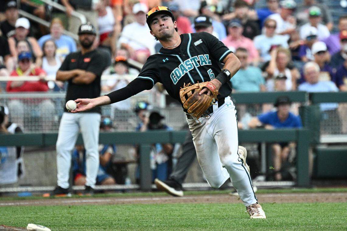 Coastal Carolina Chanticleers third baseman Walker Mitchell (5) throws to first against the Oregon State Beavers during the fourth inning at Charles Schwab Field.