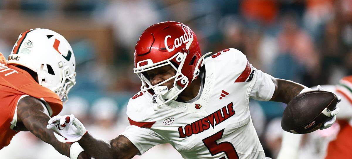 Caullin Lacy #5 of the Louisville Cardinals 