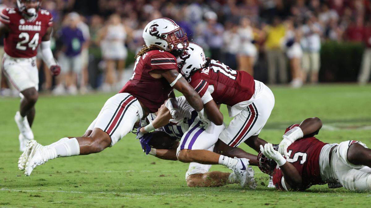 South Carolina linebacker Debo Williams (0) collides with teammate South Carolina defensive back Keenan Nelson Jr. (18) while going for a tackle during the first half of the Gamecocks’ game at Williams-Brice Stadium in Columbia on Saturday, September 9, 2023.