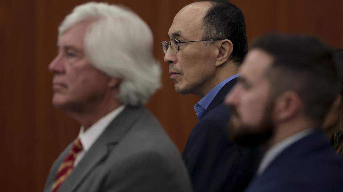 Rick Chow stands with his attorneys, Joe McCulloch, left, and Curtis Copeland during the trial of Rick Chow on Monday, June 1, 2026.