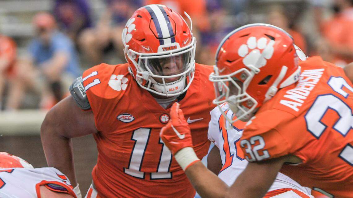 April 15, 2023; Clemson, SC , USA; Clemson defensive lineman Peter Woods (11) tackles Clemson running back Keith Adams Jr (19) during the fourth quarter the annual Orange and White Spring game at Memorial Stadium in Clemson, S.C. Saturday, April 15, 2023.
