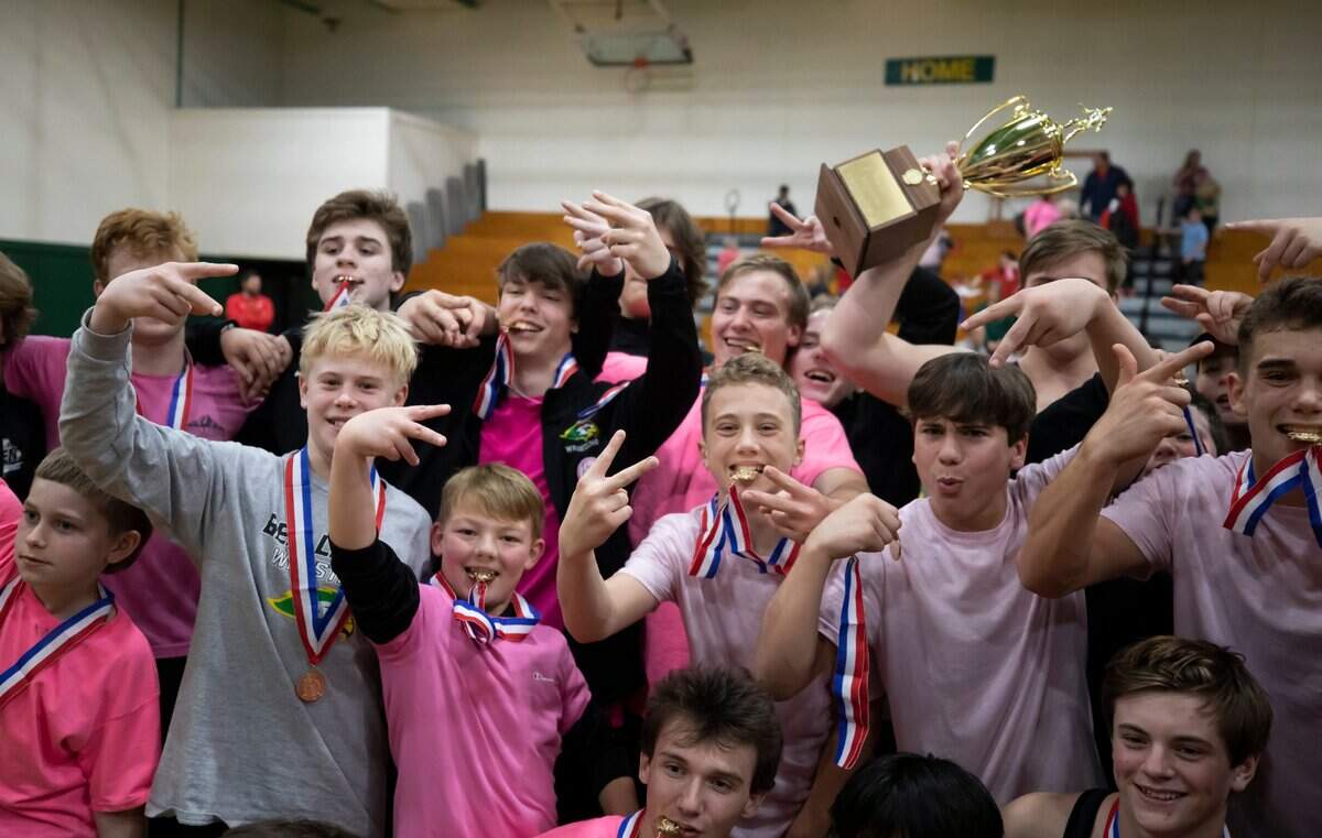 Members of the Ben Lippen wrestling team celebrate their win over the Hammond School in the SCISA 2022 Duals State Wrestling Tournament at Ben Lippen on Saturday, February 5, 2022.