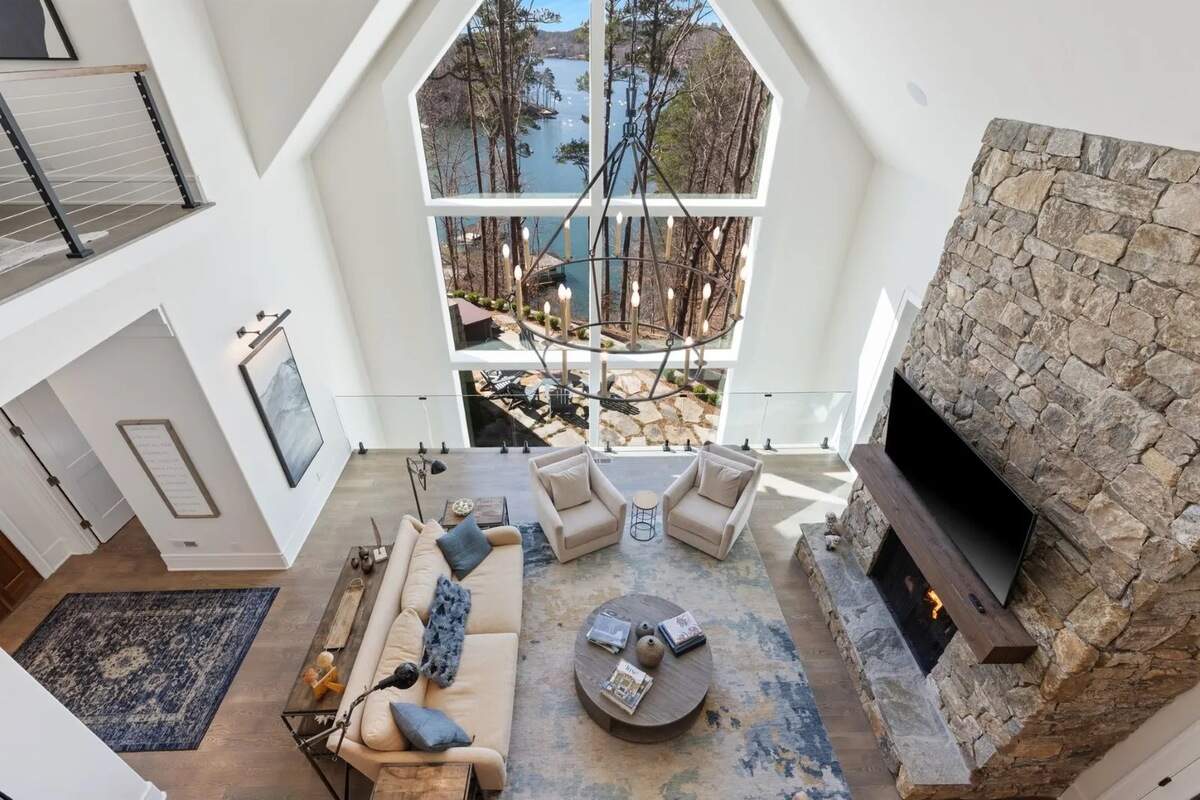 An overhead look of the main room and tall windows.