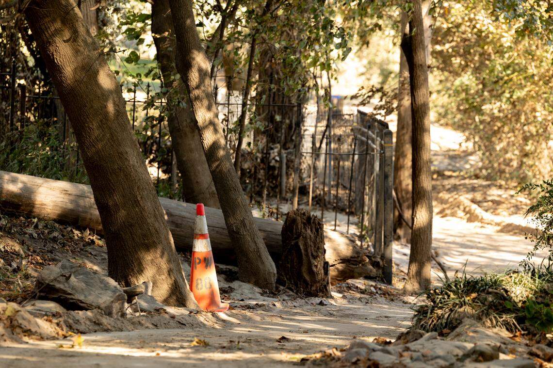 A layer of mud and debris, washed up from the Congaree River, covers the Cayce Riverwalk where the Congaree River over topped its banks. Heavy rains upstream from Hurricane Helene caused the river to crest at 30.58 feet.
