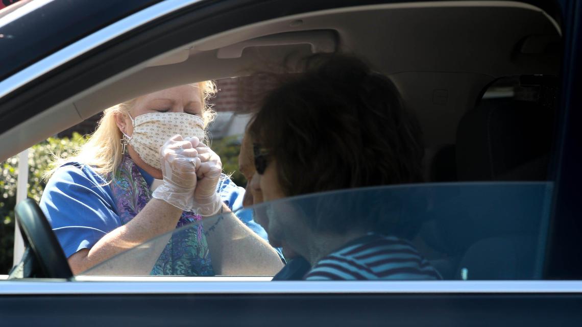 Drive-thru communion is a new Easter week tradition in the age of coronavirus