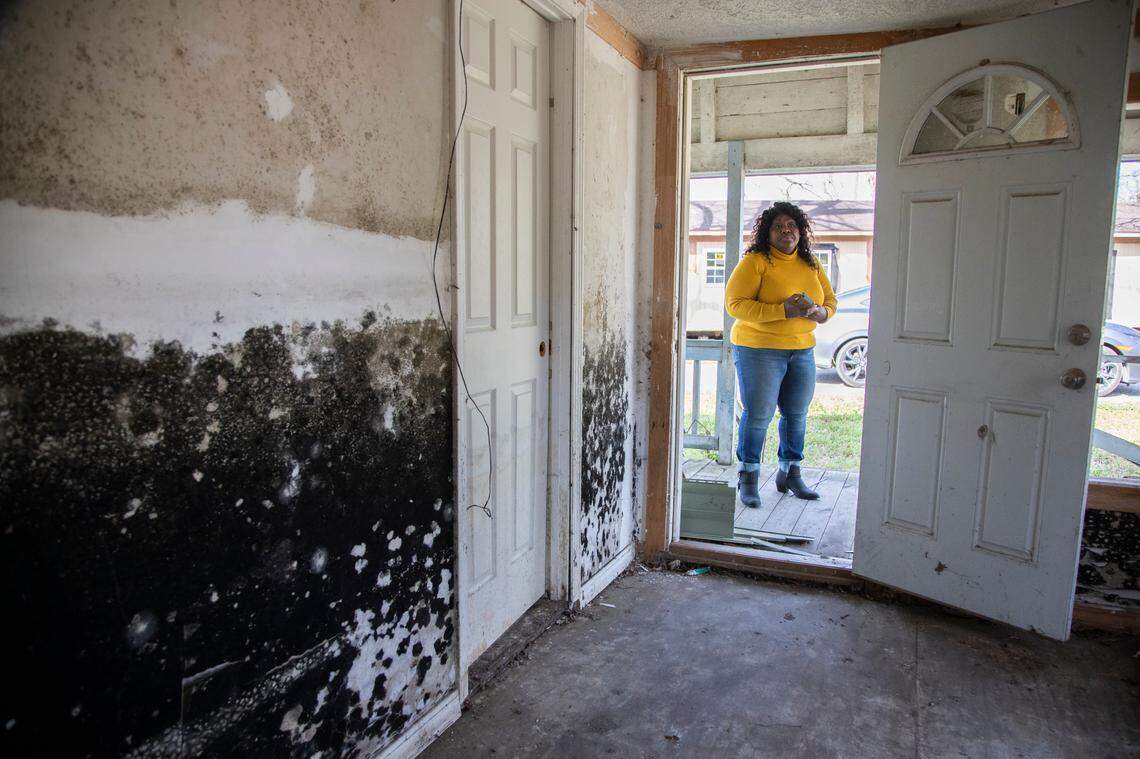 Sellers, South Carolina Mayor Barbara Hopkins shows homes damaged by repeated flooding and hurricanes since 2015.