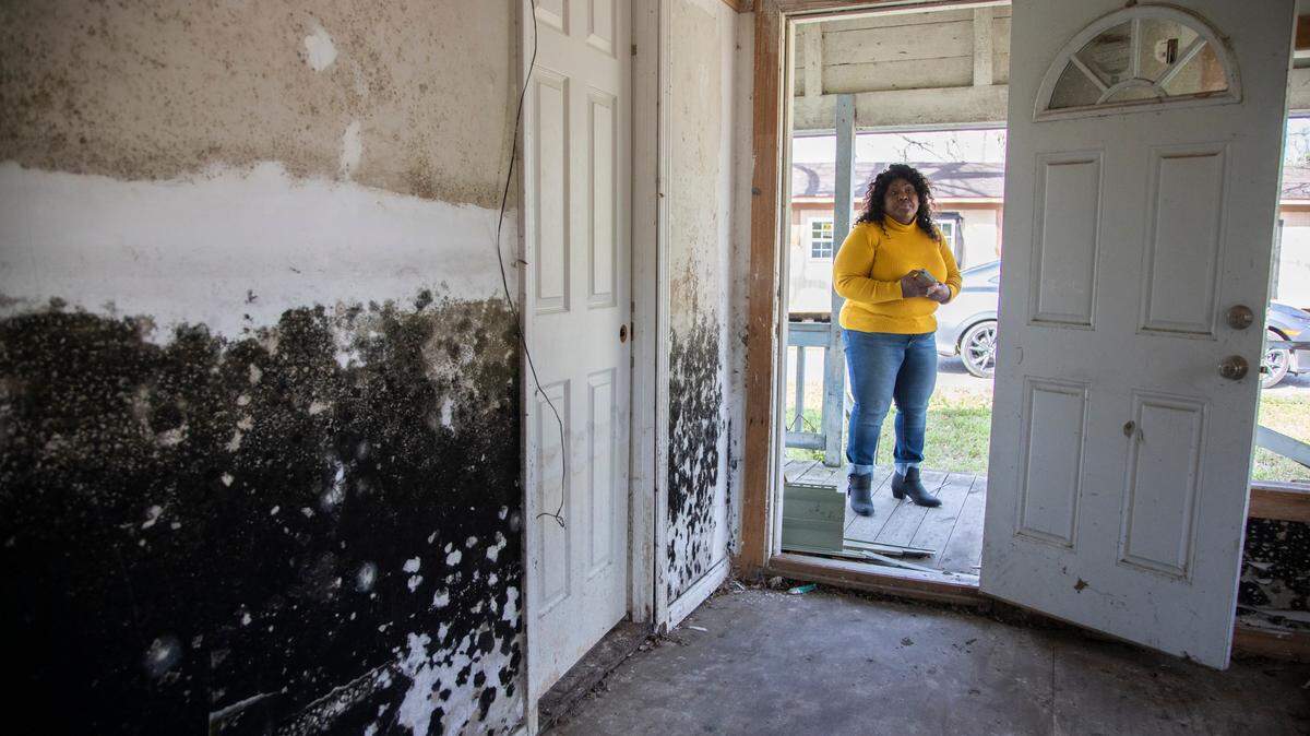 Sellers, South Carolina Mayor Barbara Hopkins shows homes damaged by repeated flooding and hurricanes since 2015.