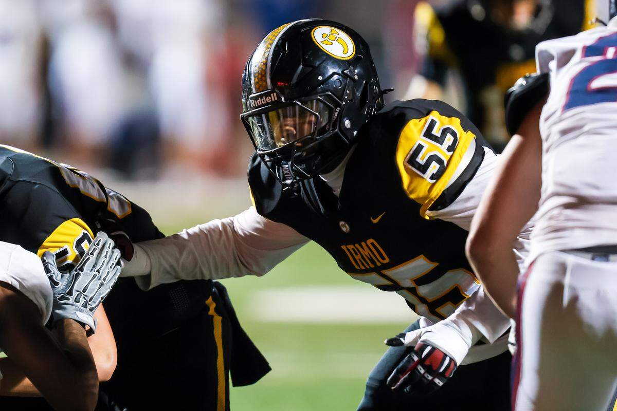 Irmo Yellow Jackets OL Nate Carson (55) blocks during the game between the White Knoll Timberwolves at the Irmo Yellow Jackets, Friday night, 10/17/25.
