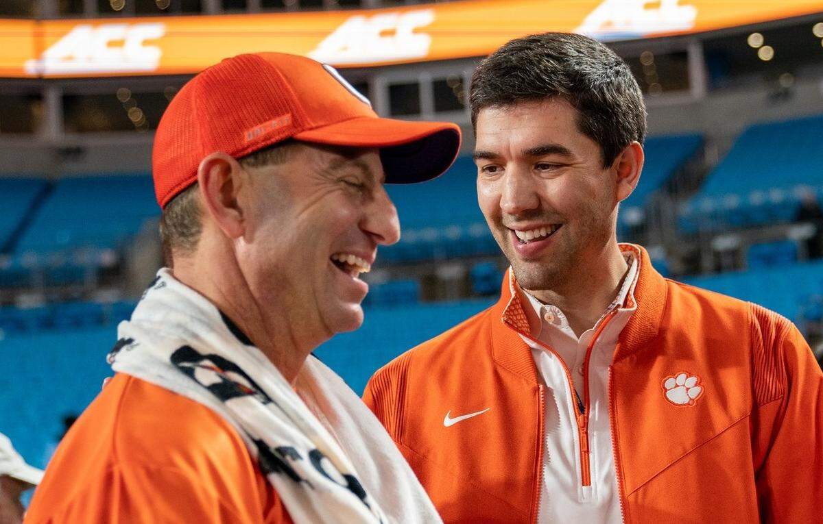 Clemson football coach Dabo Swinney (left) and athletic director Graham Neff (right)