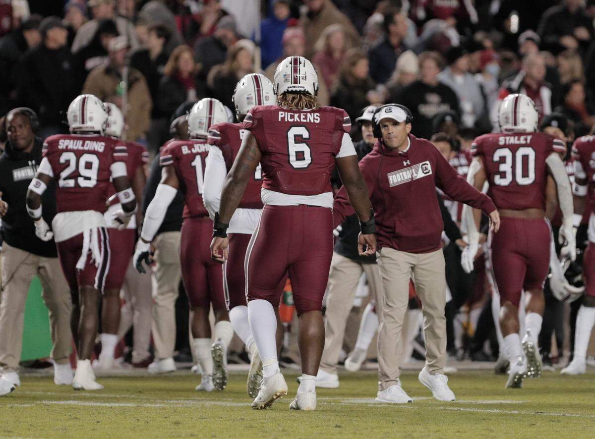 South Carolina’s head coach Shane Beamer congratulates defensive lineman Zacch Pickens (6) as the Gamecocks take on Florida on Saturday, Nov, 6, 2021 at Williams-Brice Stadium.