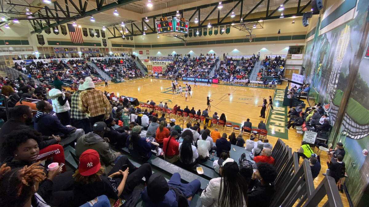 A big crowd looks on Tuesday as the Keenan and Camden high school girls basketball teams face off in their showcase game at the 2022 Chick-fil-A Classic, held at River Bluff High School.