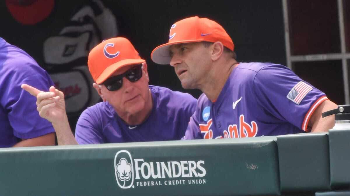 Jack Leggett and Clemson Head Coach Erik Bakich talk during the top of the ninth inning at the NCAA baseball Clemson Regional at Doug Kingsmore Stadium in Clemson, S.C. Sunday, June 1, 2025. Kentucky won 16-4, ending Clemson’s season.