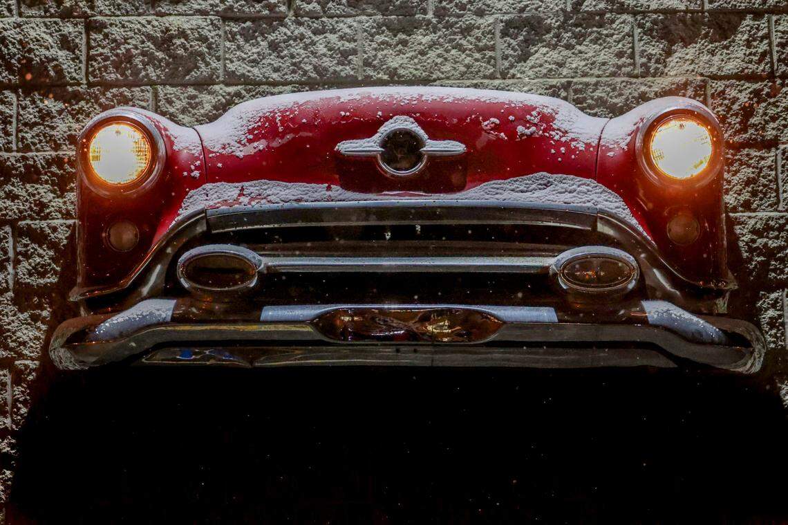 Snow sticks to the sign at Franks Car Wash in Forest Acres as a dusting of snow blankets Columbia on Tuesday, Jan. 21, 2025.