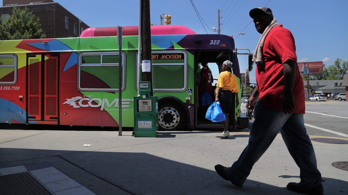 A bus arrives at the COMET Transit Center on Laurel Street in downtown Columbia.