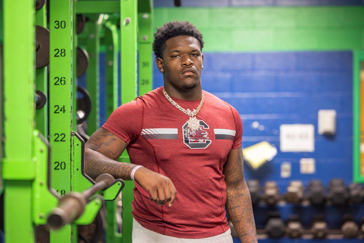 Aiden Harris is seen in the weight room at Weddington High School